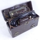 A Bakelite-cased military field telephone