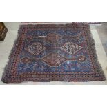 A blue ground Persian design rug, 170cm x 150cm