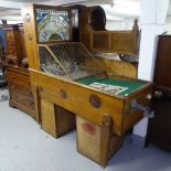 A Vintage oak-cased Skee Ball machine