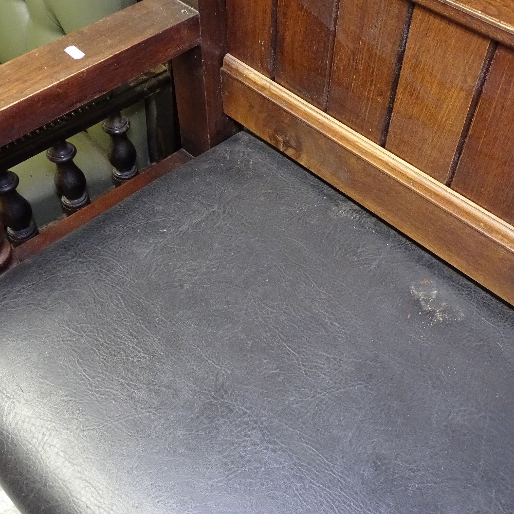 A stained hardwood and upholstered pub bench - Image 2 of 2