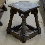 A small Antique oak stool