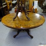 A Victorian walnut and marquetry decorated oval loo table, W135cm