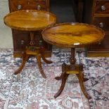 A pair of oval mahogany lamp tables, on reeded sabre leg base