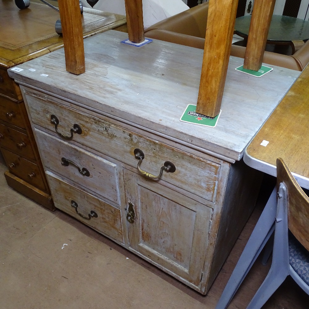A small painted pine cabinet with drawer and cupboard, W79cm, H71cm