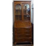 A cross-banded walnut bureau bookcase, W76cm, H190cm