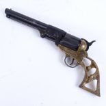 An Italian replica BKA98 Colt revolver, 7.5" barrel with brass frame (lacking grips)