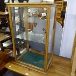 An oak-framed and glazed shop display cabinet, W54cm, H85cm