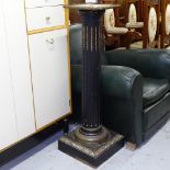 A Victorian ebonised and gilded pedestal, stepped platform base, with ormolu mounts, W26cm, H102cm