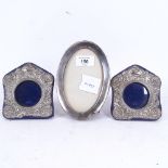 An oval silver-fronted photo frame, and a pair of silver plated photo frames, largest height 16cm (