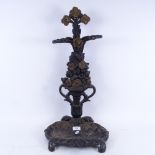An early 20th century black painted cast-iron stick stand, height 63cm