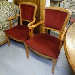 A pair of French beech open arm bedroom chairs