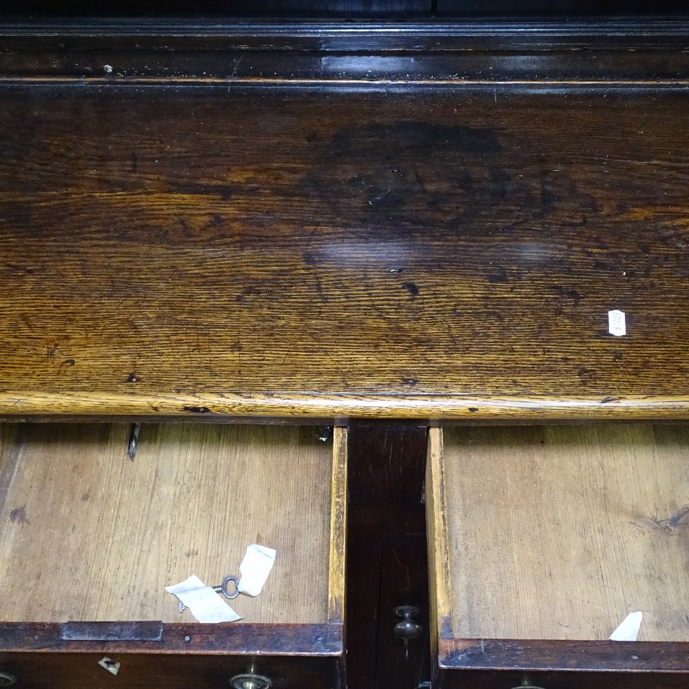 An Antique oak 2-section dresser, having a boarded open plate rack above 3 frieze drawers, with - Image 2 of 2