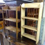 An Arts and Crafts 4-tier open bookcase, and a narrow pine open bookcase