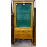 A French walnut display cabinet with serpentine glazed door, and 2 drawers under, cabriole legs