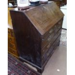 A George III mahogany bureau with a fitted interior, and 5 drawers under, on bracket feet, W100cm,