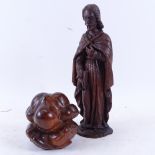 A carved oak figure of Jesus, and a carved hardwood crying man sculpture, largest height 27cm (2)