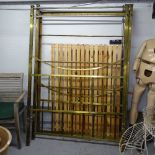 An Antique brass 4-poster 4'6" bed