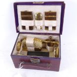 A 19th century leather-covered travelling vanity case, by Boswell Hensman, brass contents include