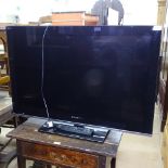 A Sony 40" flat screen TV with remote, GWO