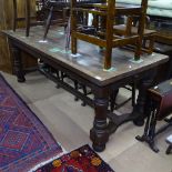 An Antique oak rectangular plank-top refectory table, with single frieze drawer, raised on turned