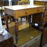 A Victorian mahogany writing table, single frieze drawer, on baluster turned legs, W91cm, H75cm