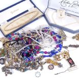 A tray of mixed costume jewellery, pearl necklaces etc