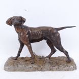 A silver painted cast-iron Pointer dog sculpture, unsigned, base length 28cm