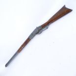 An Italian replica Winchester model 1892 smooth bore rifle, overall length 100cm
