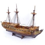 A handmade model of a 3-masted 19th century merchant ship, on stand, length 66cm, height 46cm