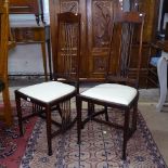 A pair of Liberty & Company Arts and Crafts Langley side chairs, circa 1950, with spindle-back and