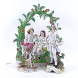 Staffordshire lover group, Continental porcelain boy gardener, and another, largest height 29cm (3)