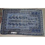 A blue ground Persian prayer rug, 130cm x 90cm