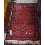A red ground prayer rug, 120cm x 80cm