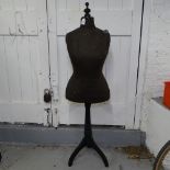 A Vintage mannequin on tripod stand