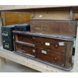 Various boxes and containers, including watch maker's table-top chest of drawers, military tin