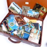 A suitcase full of postcards and ephemera