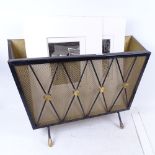 A 1950s magazine rack, length 50cm, and mounted photos