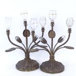 A pair of Art Nouveau brass 3-light candelabra, naturalistic design with glass shades and buds,