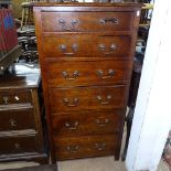 A 1920s narrow oak 6-drawer chest, W60cm, H123cm