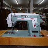 A Vintage New Home model 532 sewing machine