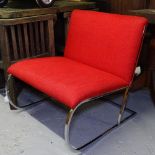 A contemporary designer chrome-framed lounge chair