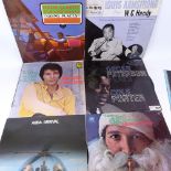 A box of LPs, including Oscar Peterson, Cleo Laine, and Barbara Streisand