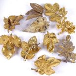 10 gilded leaf design brooches, in the style of Flora Danica