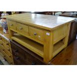 A modern solid oak rectangular coffee table, with 3 fitted drawers, W110cm, H49cm