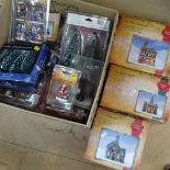 A collection of Boxed Christmas village display sets gwo
