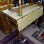 A Victorian pine Pembroke table with end frieze drawer, W90cm, H75cm