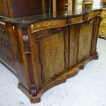 A 19th century rosewood chiffonier of serpentine form, with applied moulded decoration, and