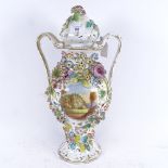 A 19th century Coalbrookdale 2-handled vase and cover, with painted castle scene and encrusted