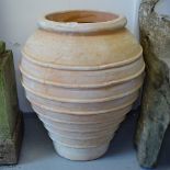 An unglazed terracotta Cretan design oil jar, H65cm