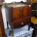 A George III mahogany night stand/commode, with panelled doors, W54cm, H79cm